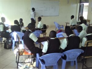 Teacher-in-class-with-students.